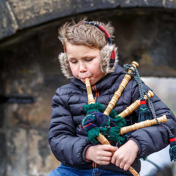 Scottish Child Playing bagpipes